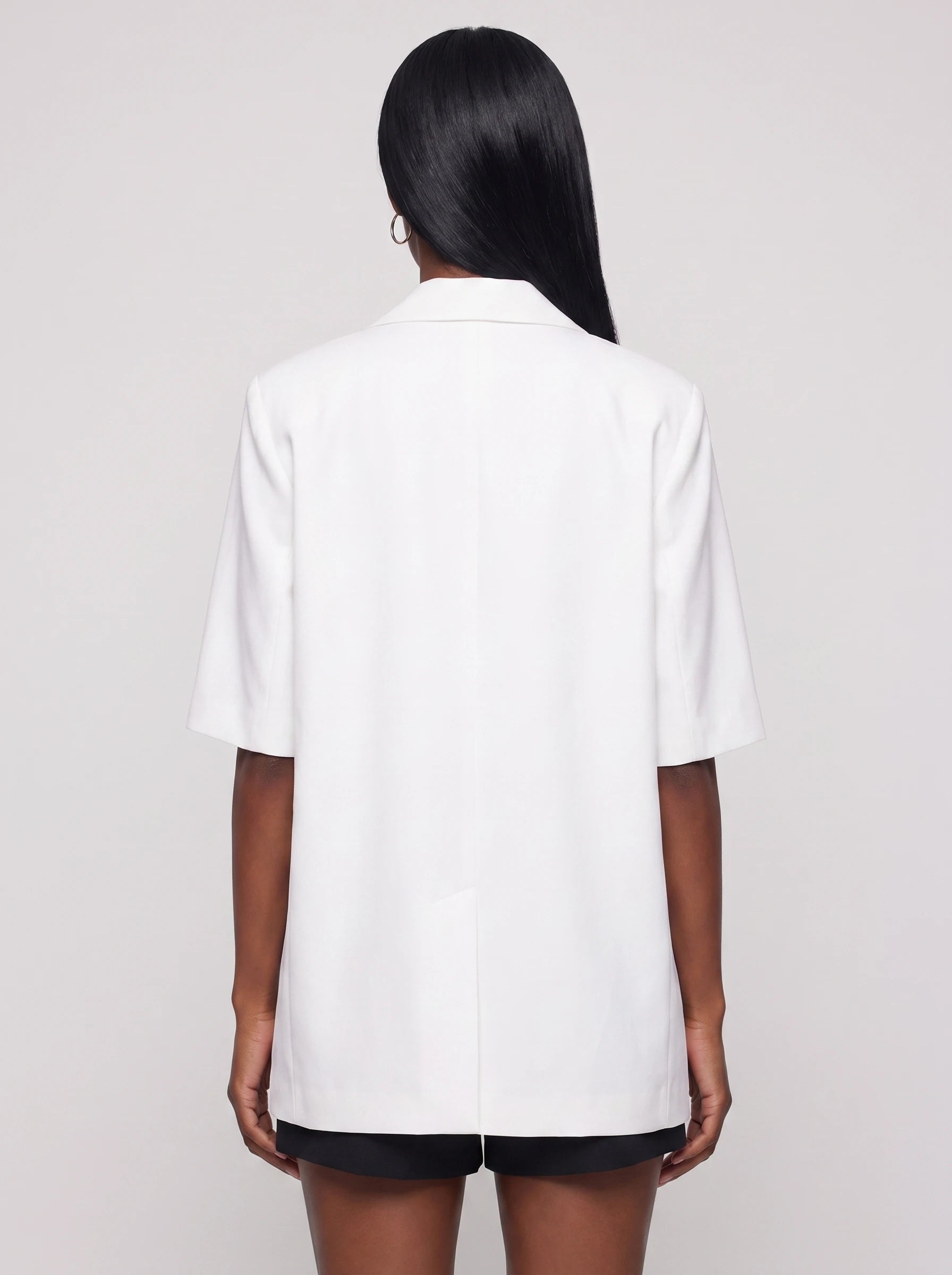 Blazer oversize à manches courtes blanc Arlette, vue de dos en studio