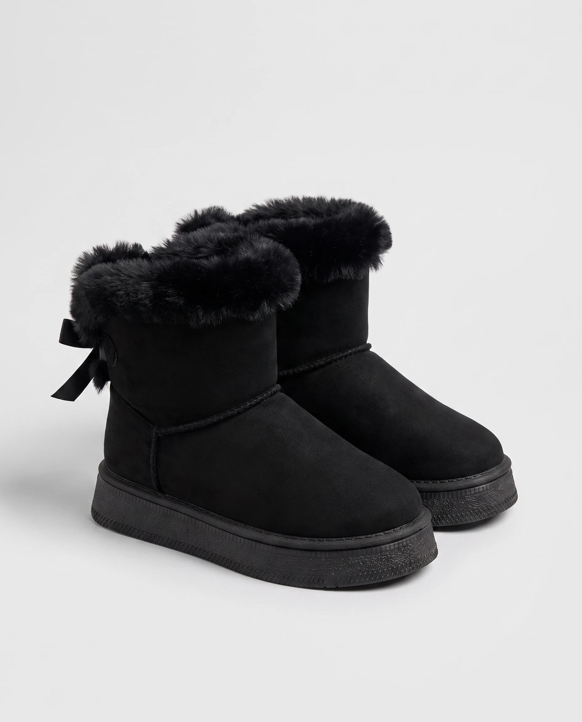Bottes de neige à nœud et col fourrure Opaline — Noir, paire en packshot studio