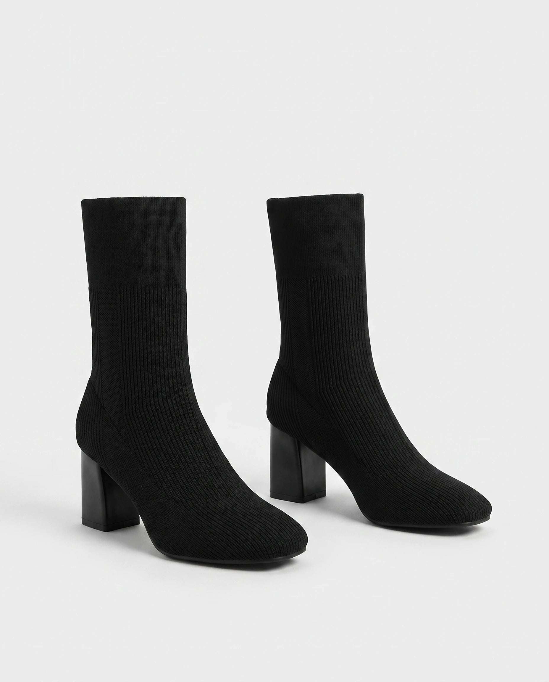 Bottines chaussettes en maille a talon haut Adelphine Noir — packshot studio