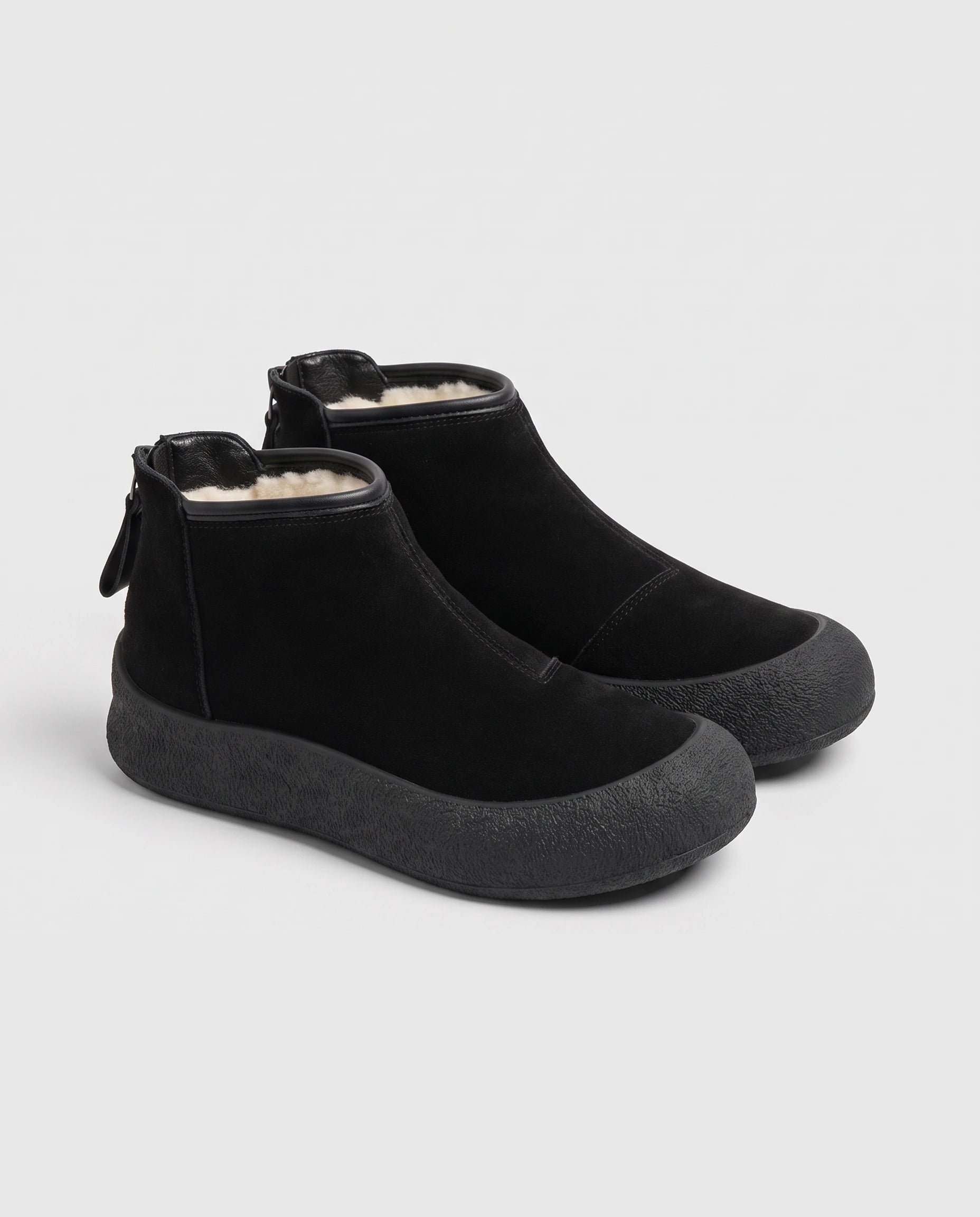 Bottines de neige plates à zip dos Clarine — Noir, paire en packshot studio