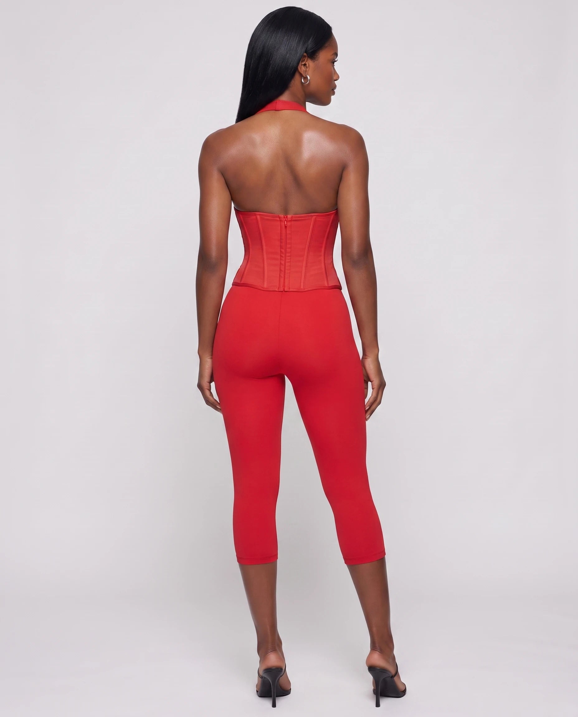 Combinaison moulante à corset Marlène – rouge – vue de dos studio