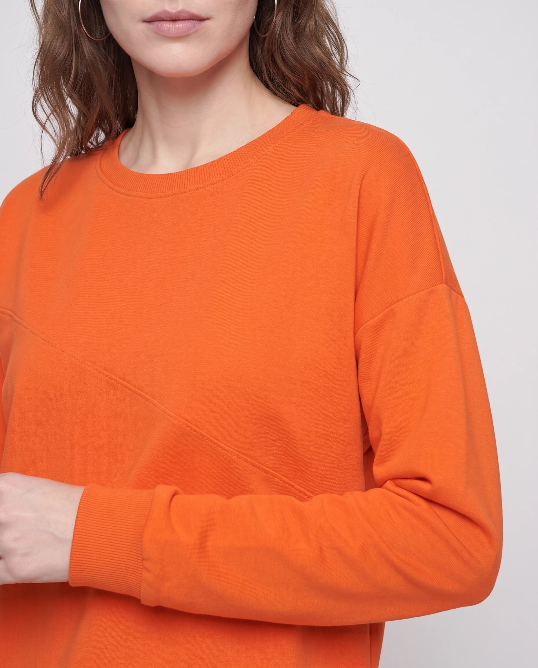 Ensemble sweat asymétrique et pantalon Bénédicte — Orange — détail ourlet asymétrique