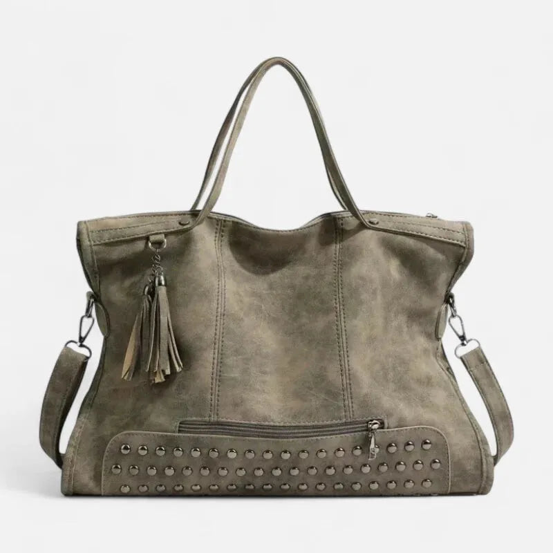 Grand sac à main bandoulière avec dessous clouté et charms pompon Giulia