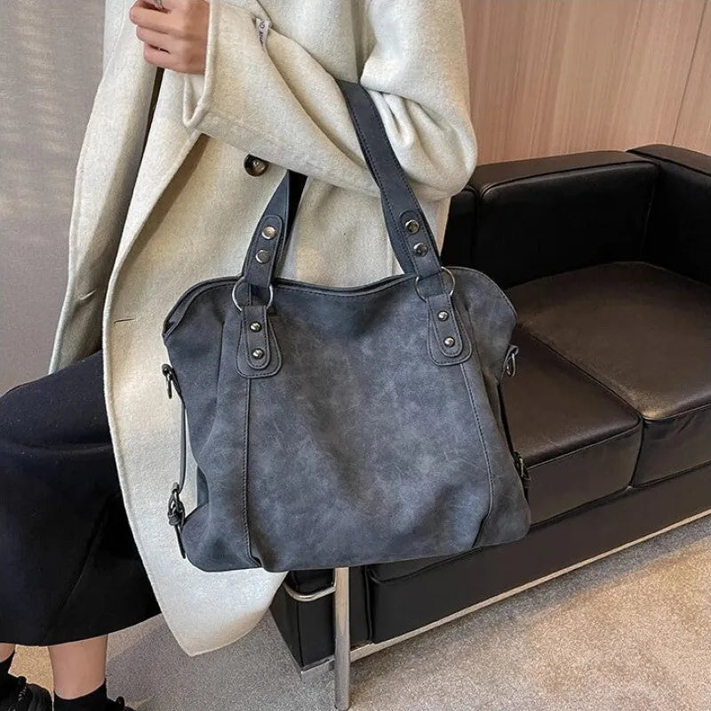 Grand sac à main bandoulière de cours rétro souple Iris