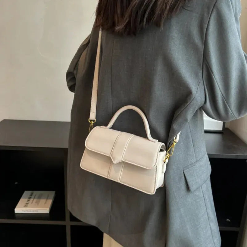 Petit sac à main bandoulière à rabat Amalia
