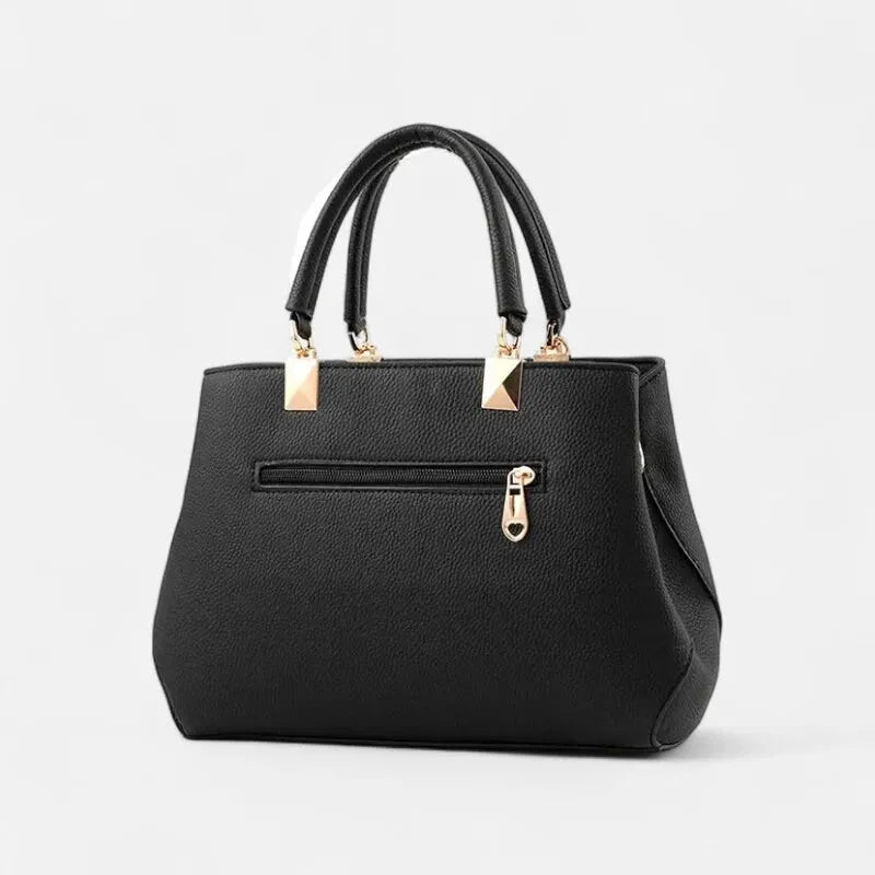 Petit sac à main bandoulière avec son charms noeud et fleur Léana