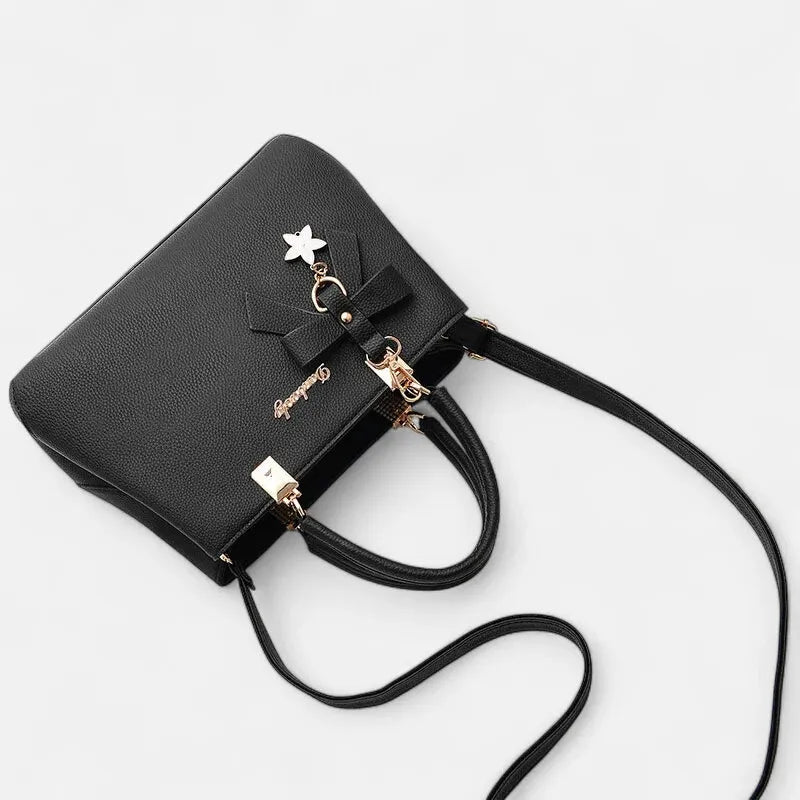Petit sac à main bandoulière avec son charms noeud et fleur Léana
