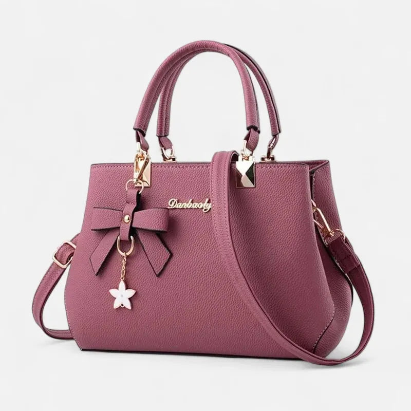 Petit sac à main bandoulière avec son charms noeud et fleur Léana