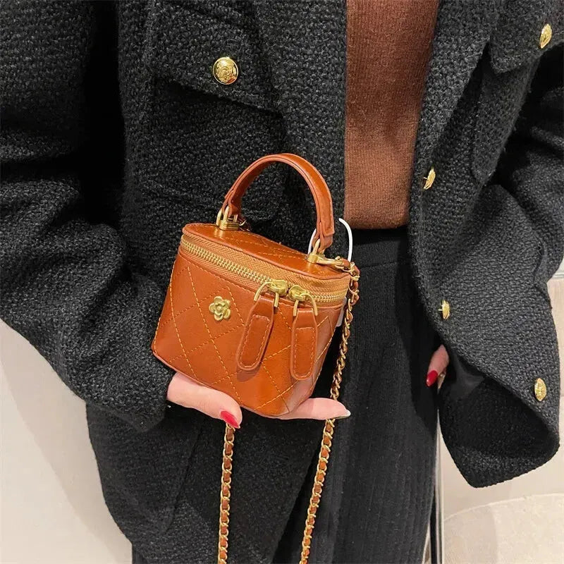 Petit sac à main bandoulière cubique matelassé au finition doré Aurore