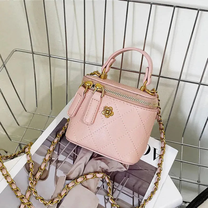 Petit sac à main bandoulière cubique matelassé au finition doré Aurore