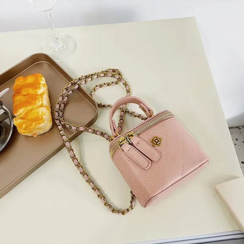Petit sac à main bandoulière cubique matelassé au finition doré Aurore