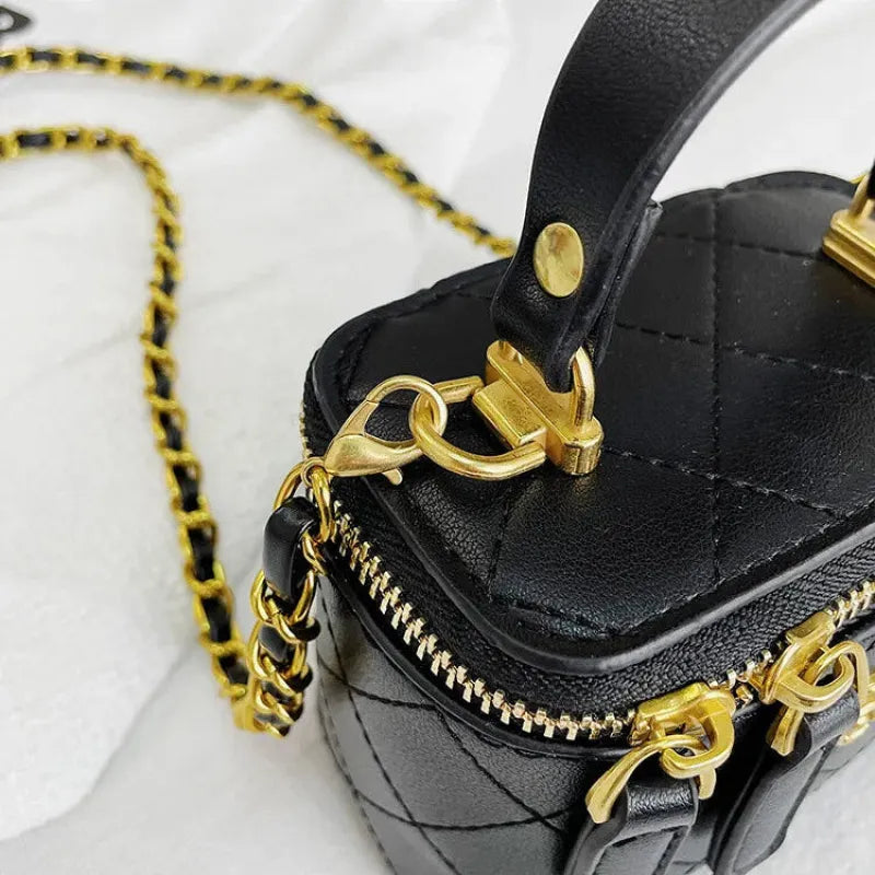 Petit sac à main bandoulière cubique matelassé au finition doré Aurore