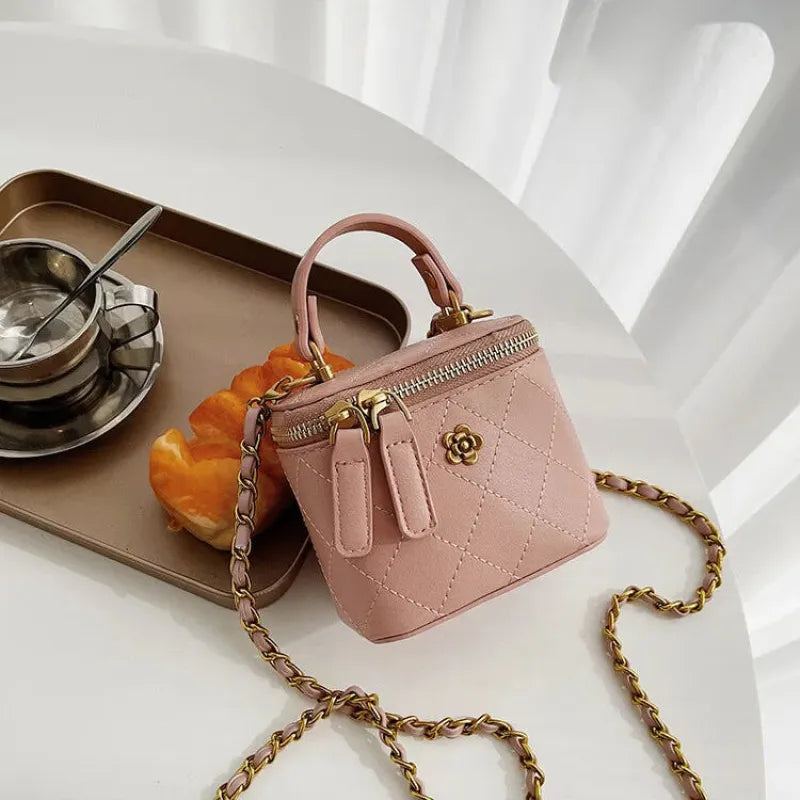 Petit sac à main bandoulière cubique matelassé au finition doré Aurore