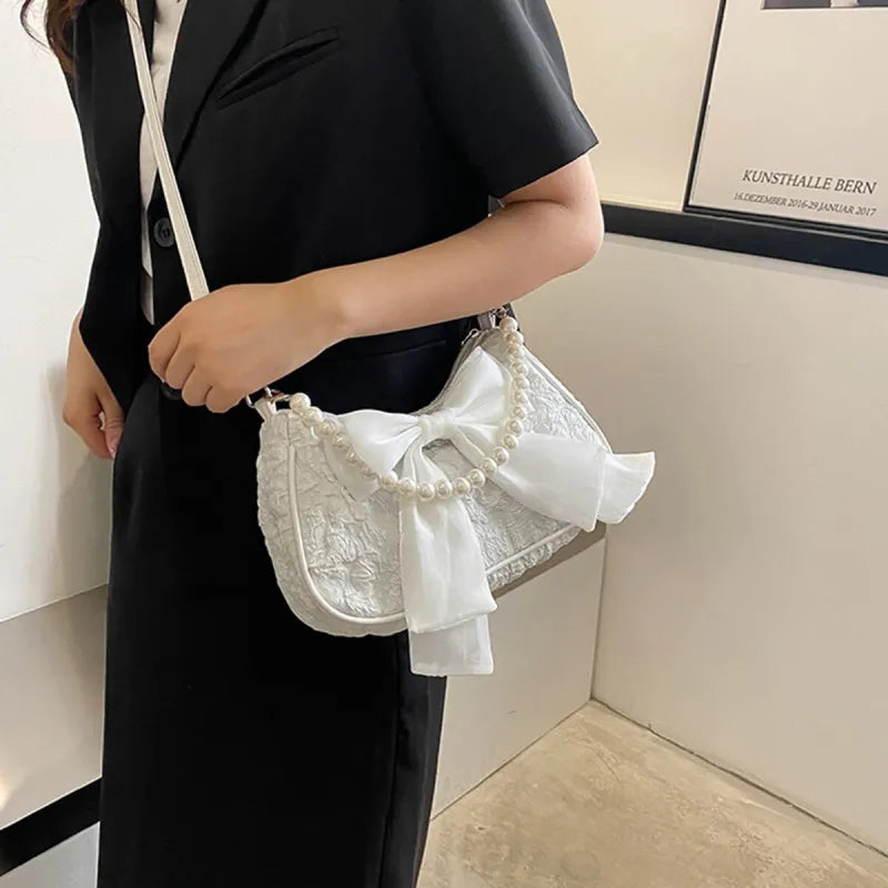 Petit sac à main bandoulière hobo en coton avec anse en perle et noeud décoratif Camille