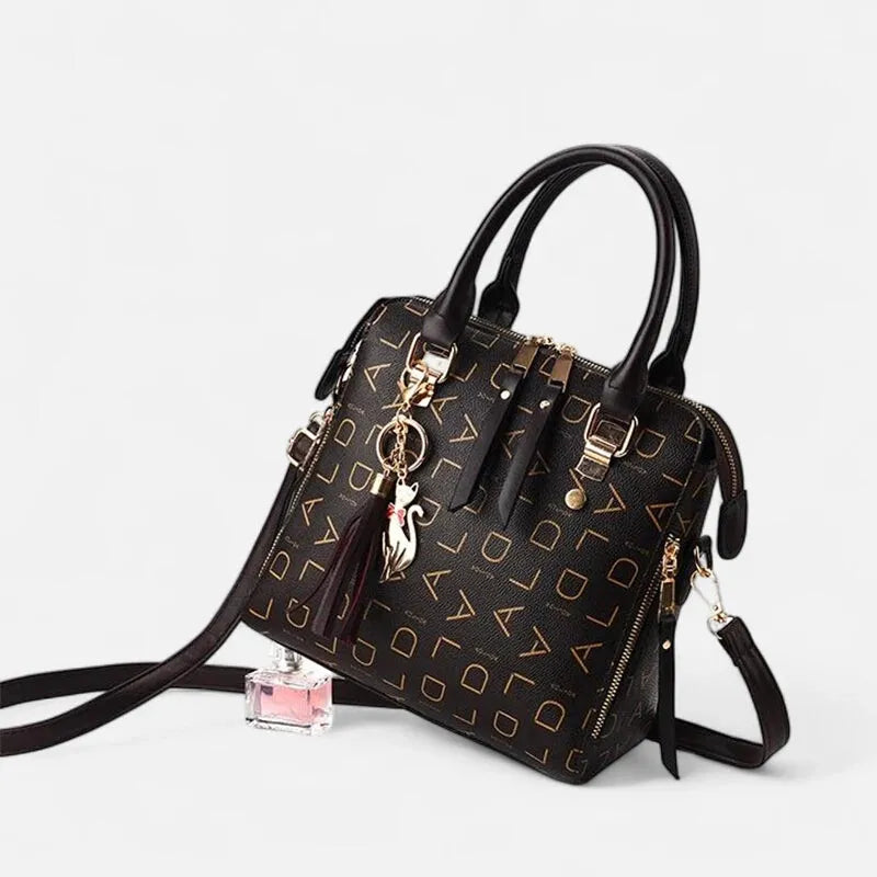 Sac à main bandoulière avec son charms chat doré Émilie