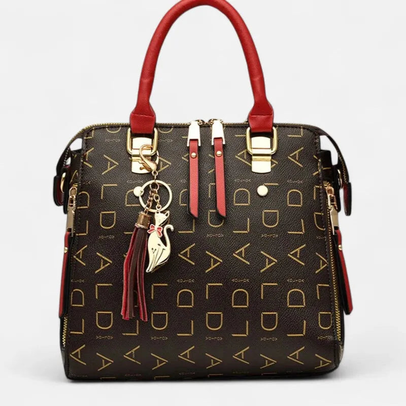 Sac à main bandoulière avec son charms chat doré Émilie