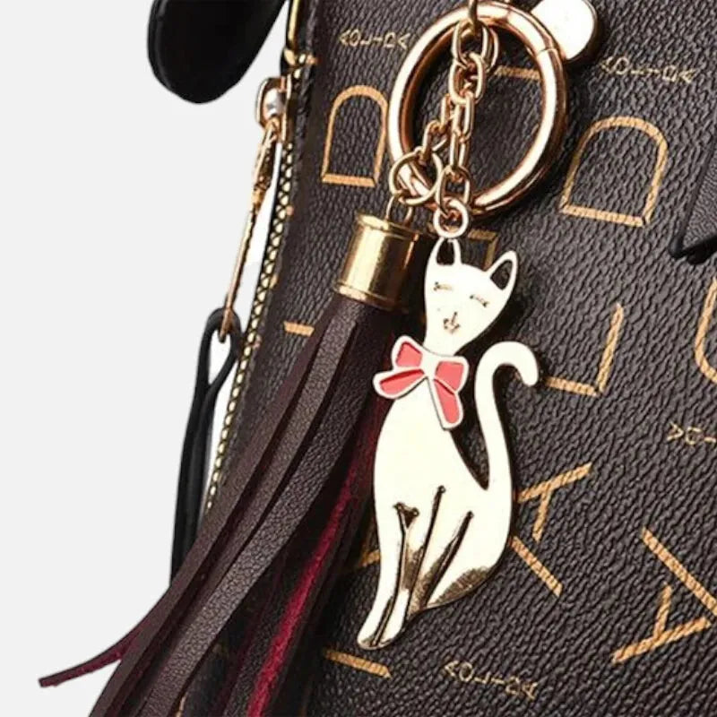Sac à main bandoulière avec son charms chat doré Émilie
