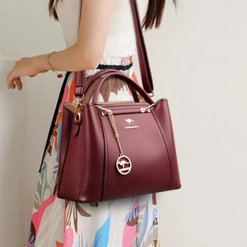 Sac à main bandoulière avec son charms doré Amandine