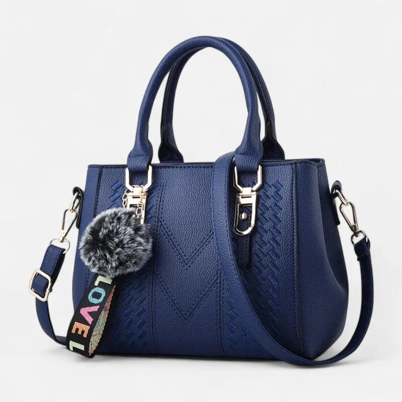 Sac à main bandoulière avec son charms pompon Aurore
