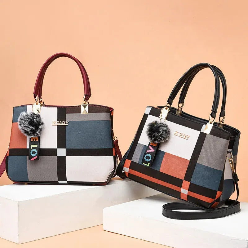 Sac à main bandoulière avec son charms pompon Livia