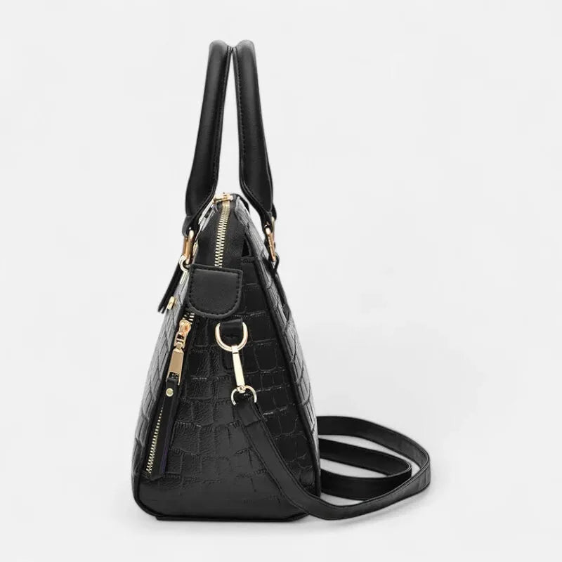 Sac à main bandoulière imitation croco avec son charms chat doré Camélia