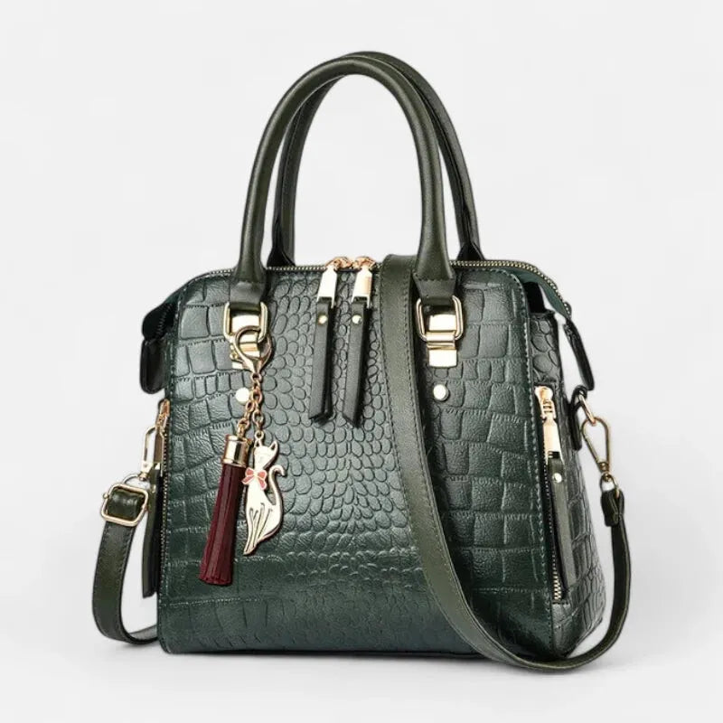 Sac à main bandoulière imitation croco avec son charms chat doré Camélia
