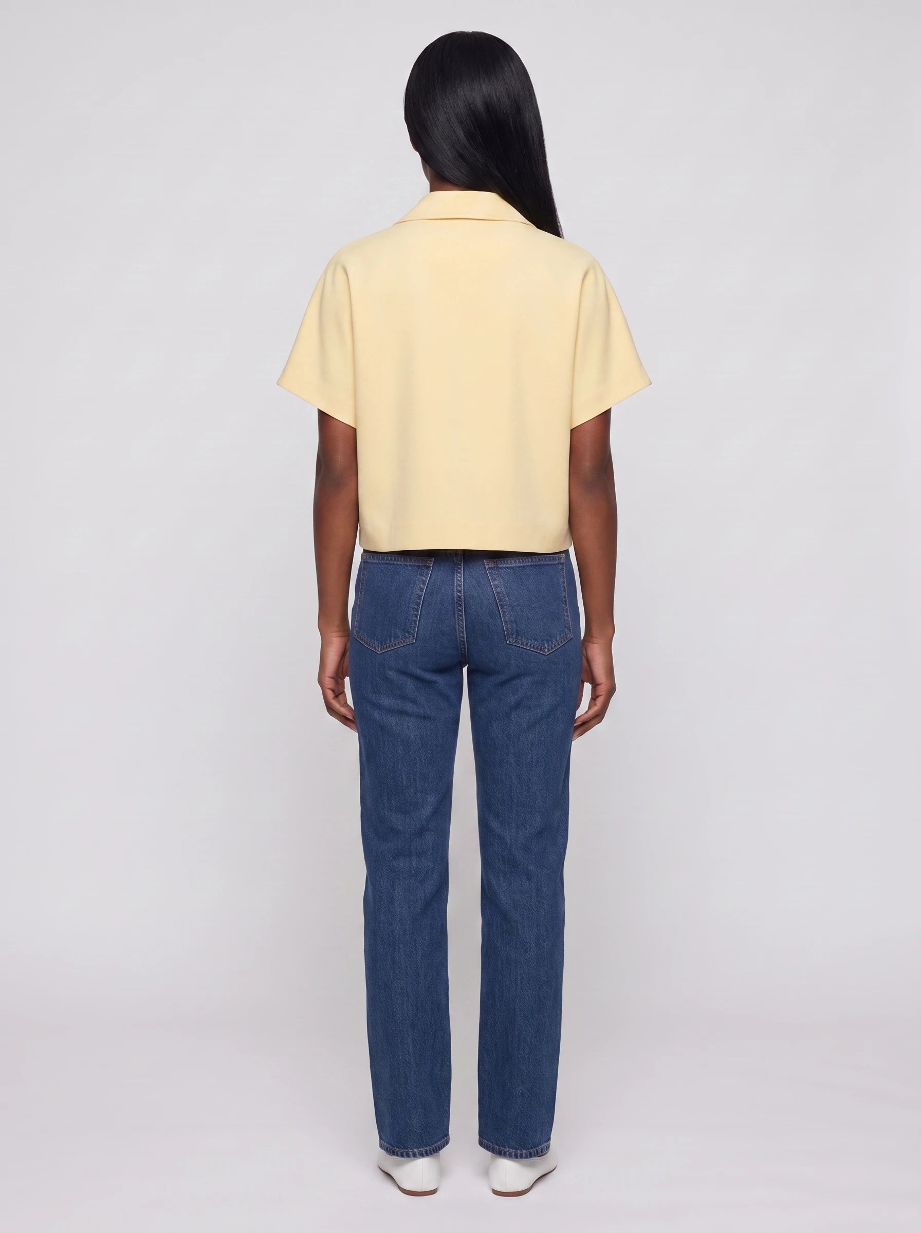 Veste courte zippée à manches courtes jaune pâle Gilberte, vue de dos en studio