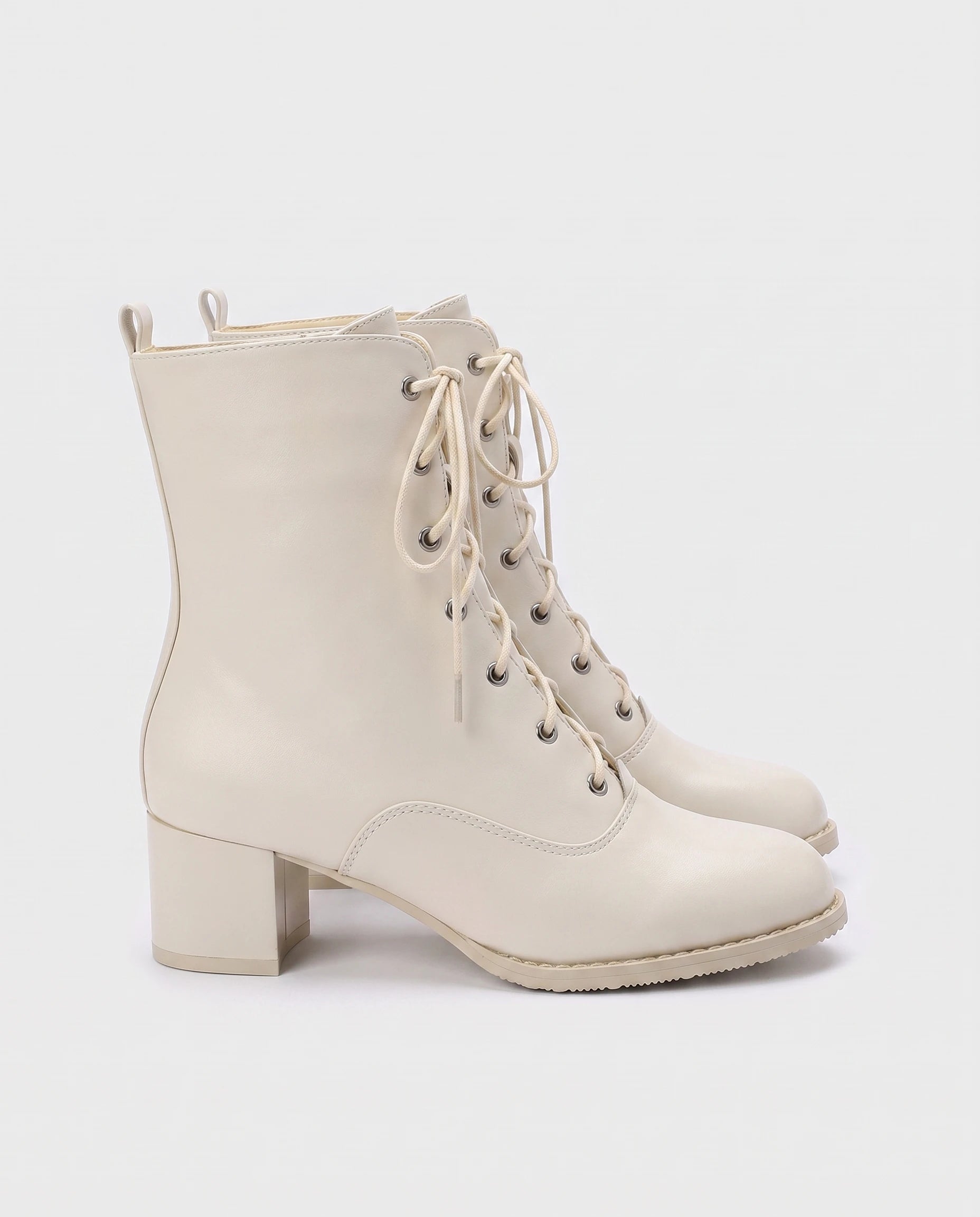Bottines à lacets à talon effet cuir Alphonsine — Blanc Cassé, paire vue de profil studio
