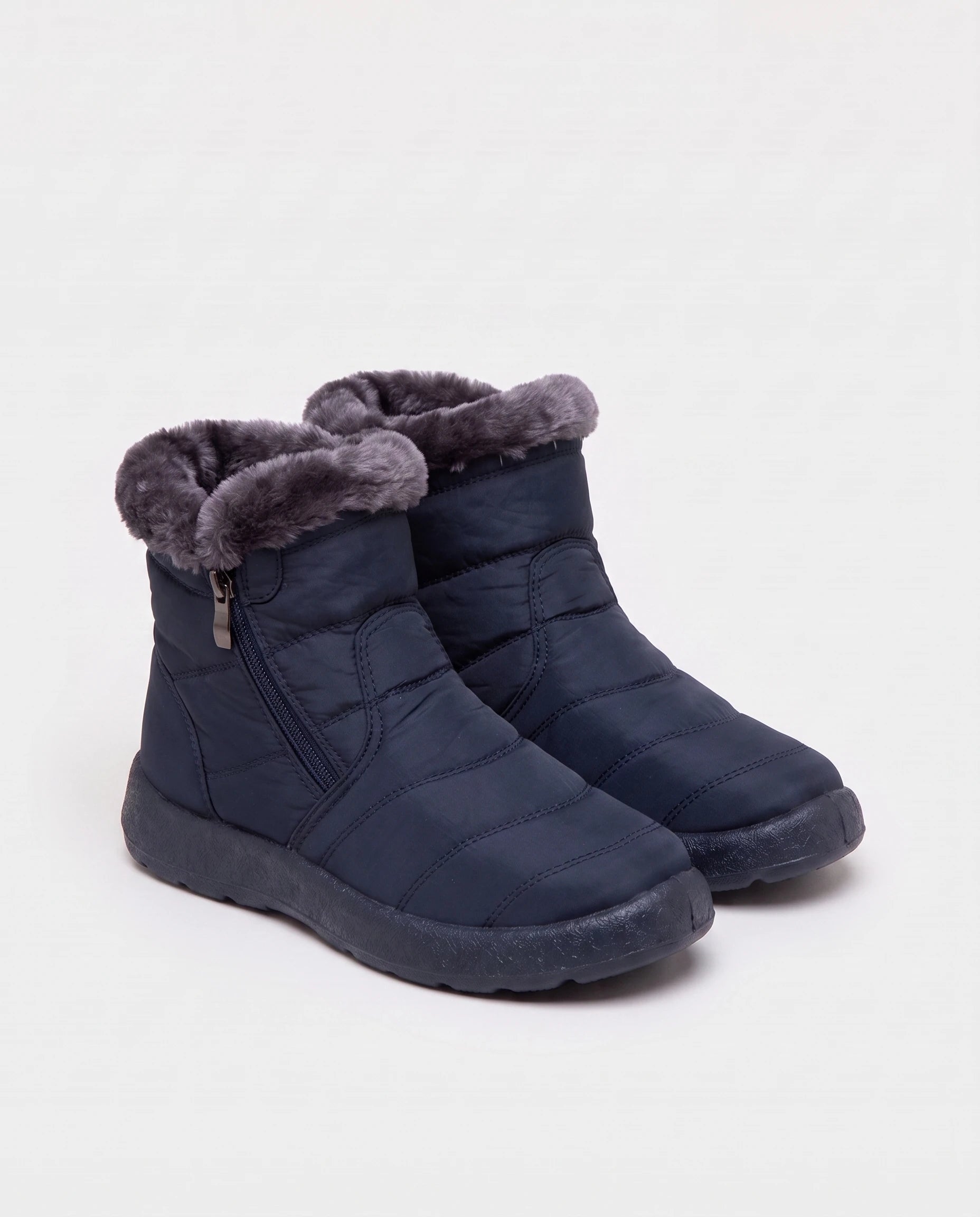 Bottines de neige fourrées Noëlle — Bleu Marine, paire vue de trois quarts studio