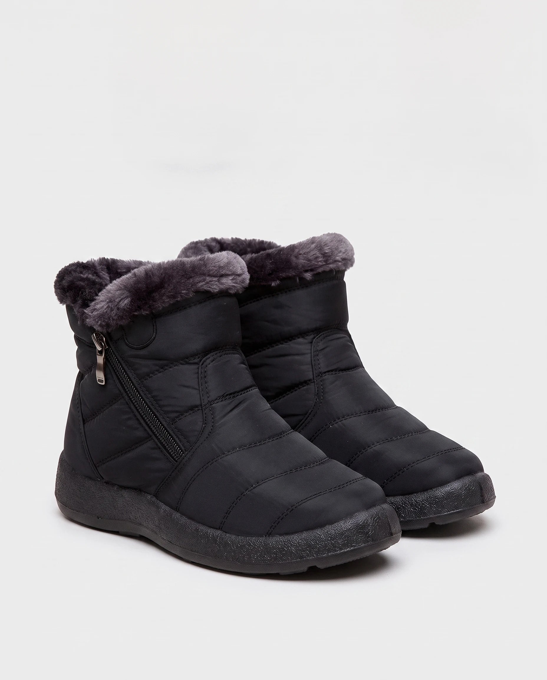Bottines de neige fourrées Noëlle — Noir, paire vue de trois quarts studio