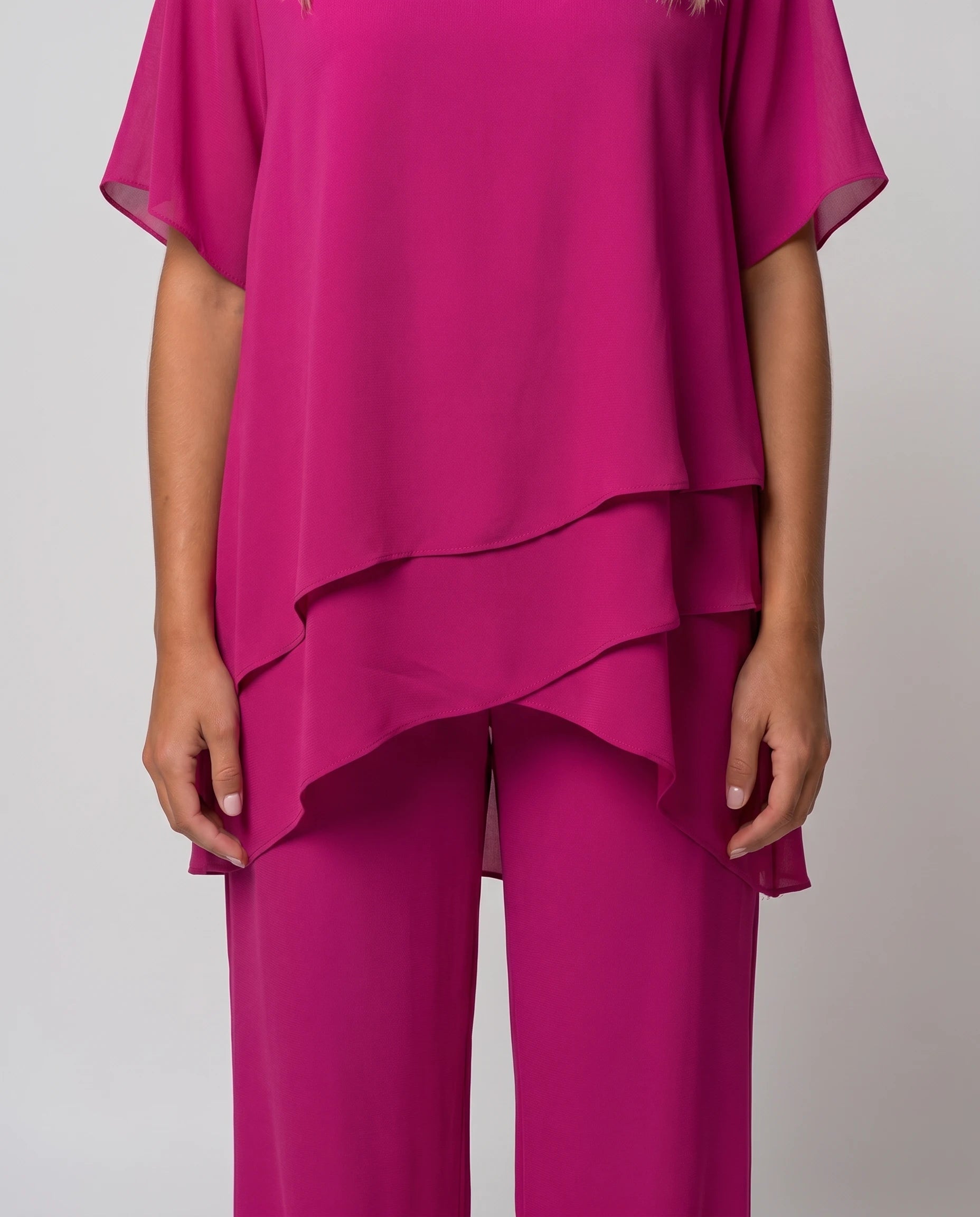 Ensemble top asymétrique et pantalon large Armelle — Fuchsia — détail ourlet asymétrique