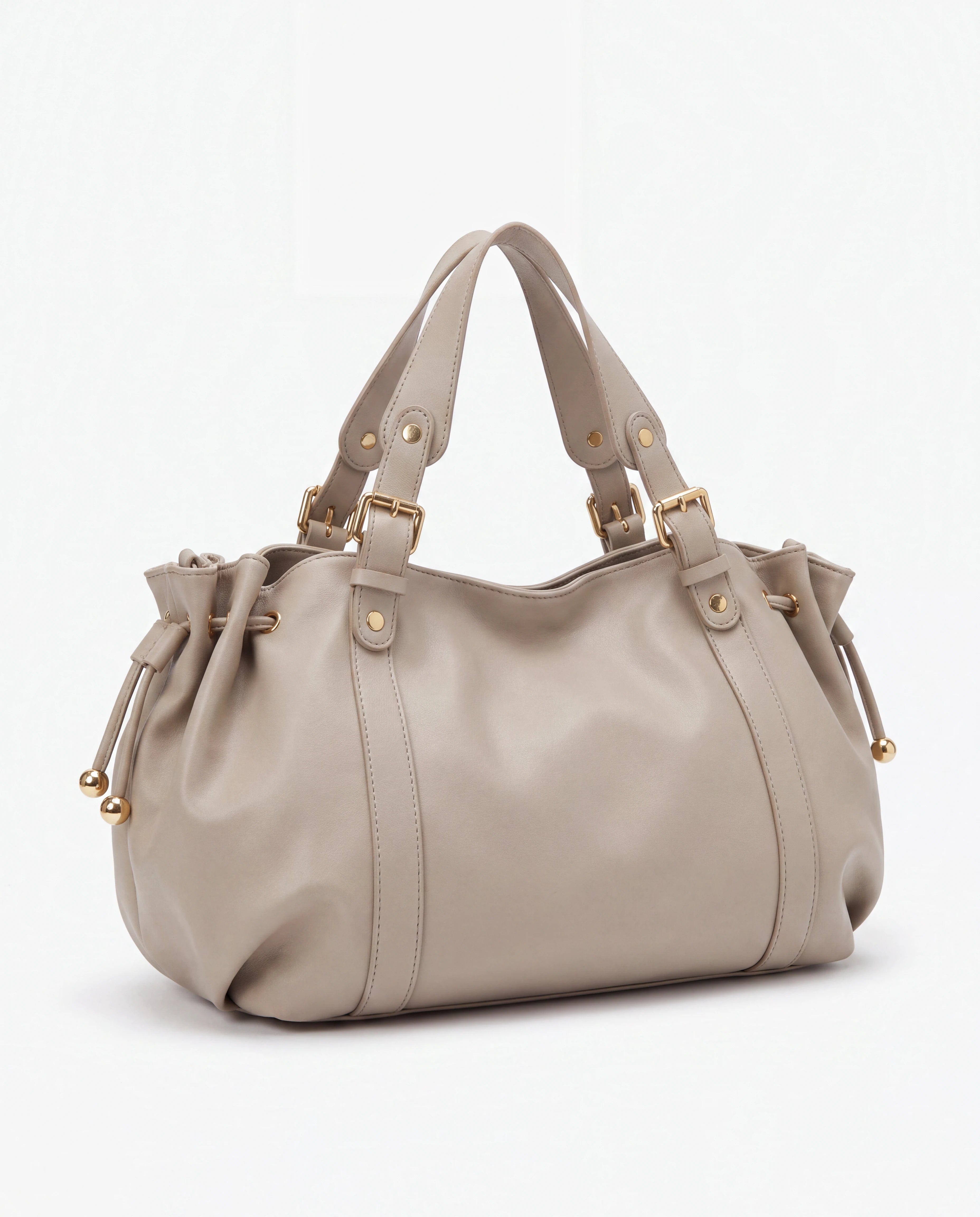 Grand sac à main de cours bowling souple Enora coloris Beige — vue de trois quarts sur fond studio