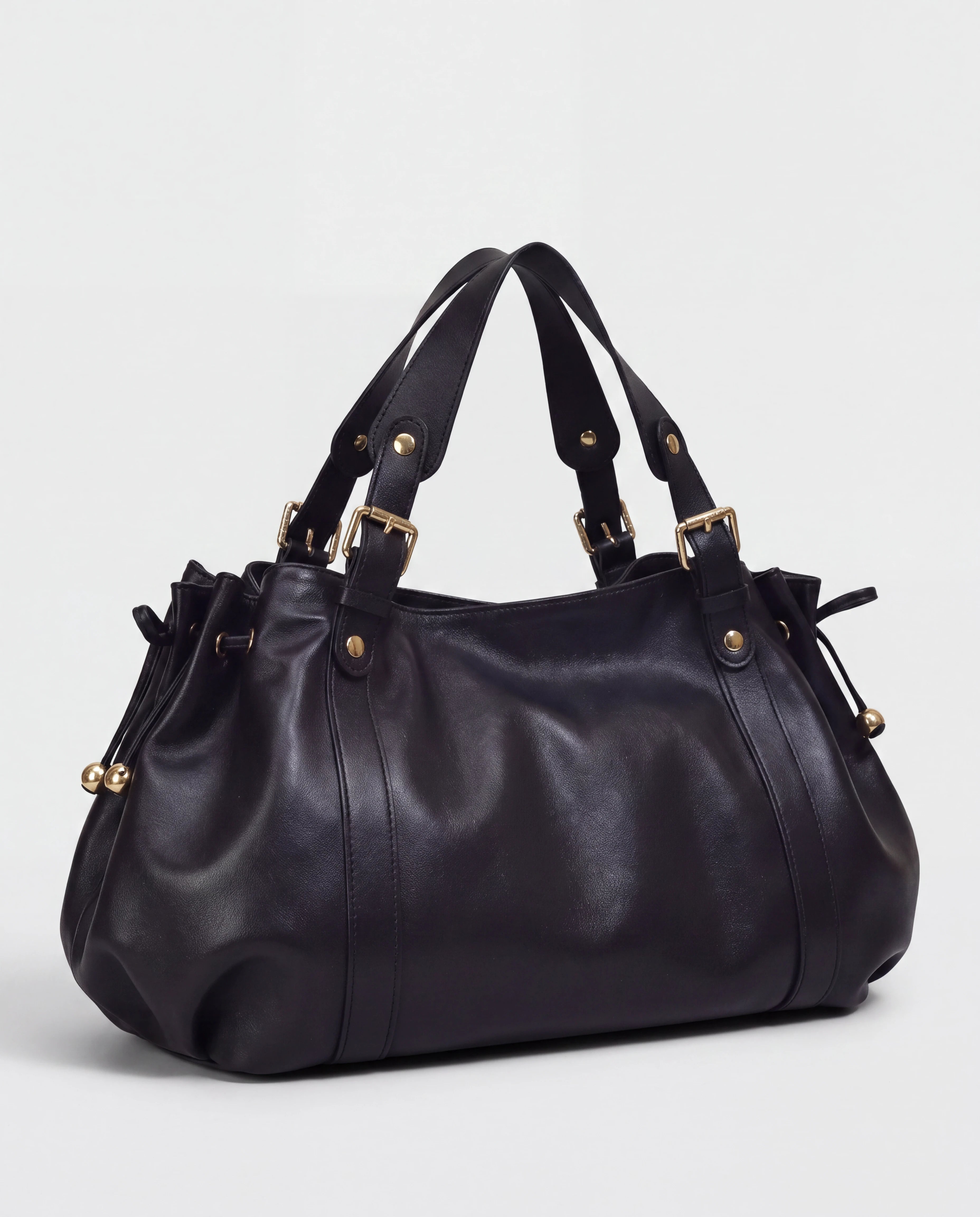 Grand sac à main de cours bowling souple Enora coloris Noir — vue de trois quarts sur fond studio
