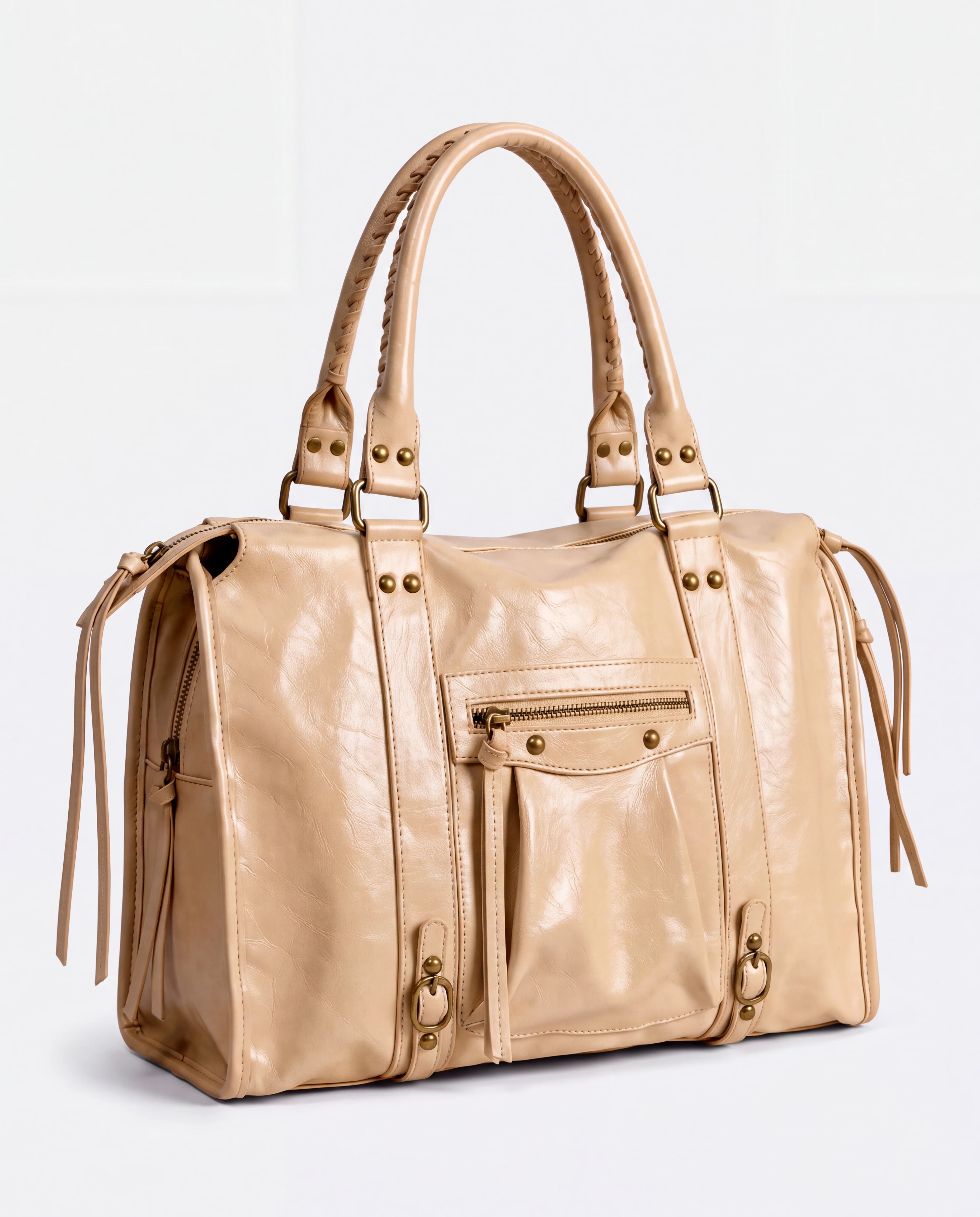 Grand sac à main de cours vintage à franges et bandoulière Laurine coloris Beige — vue de trois quarts sur fond studio