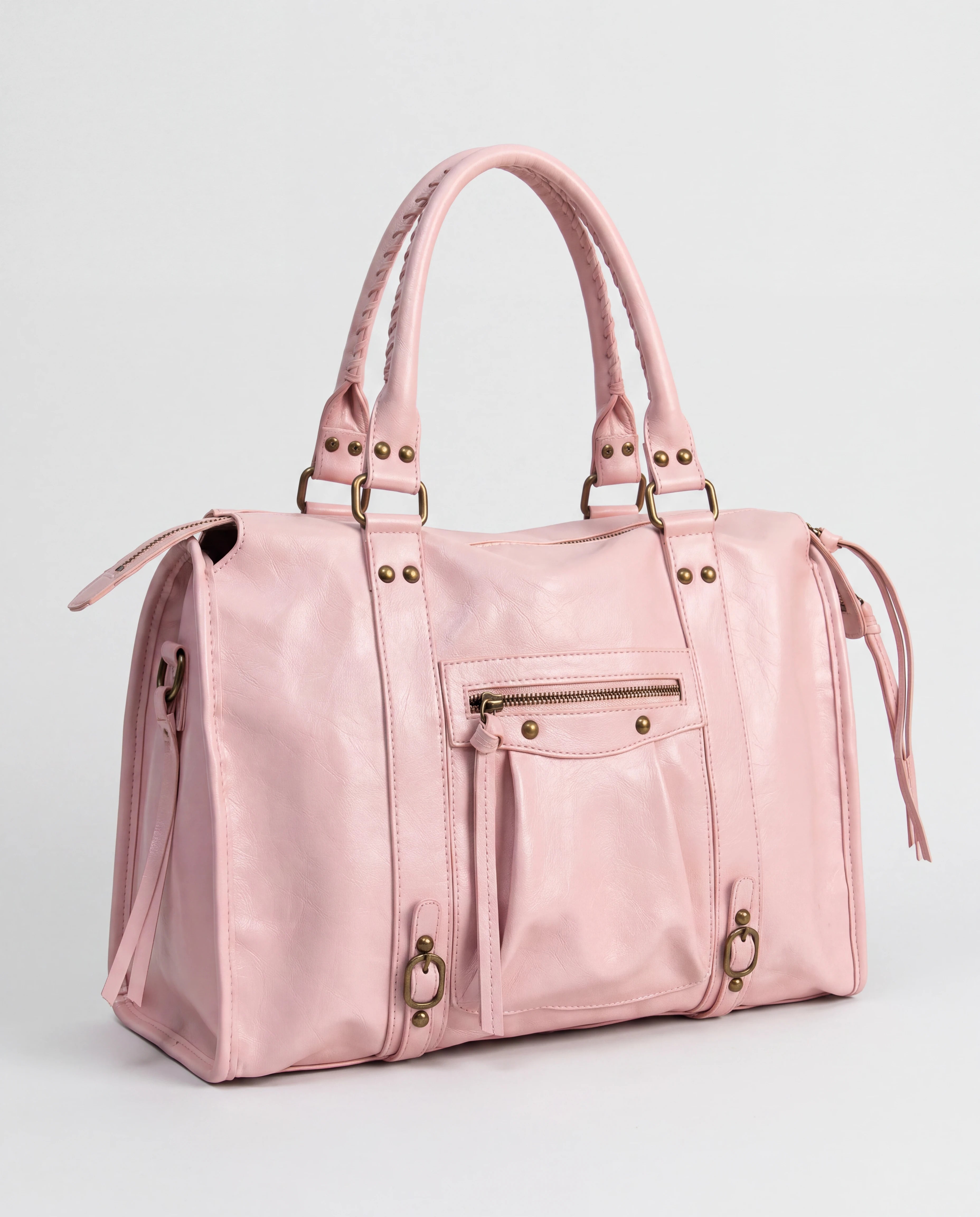 Grand sac à main de cours vintage à franges et bandoulière Laurine coloris Rose — vue de trois quarts sur fond studio