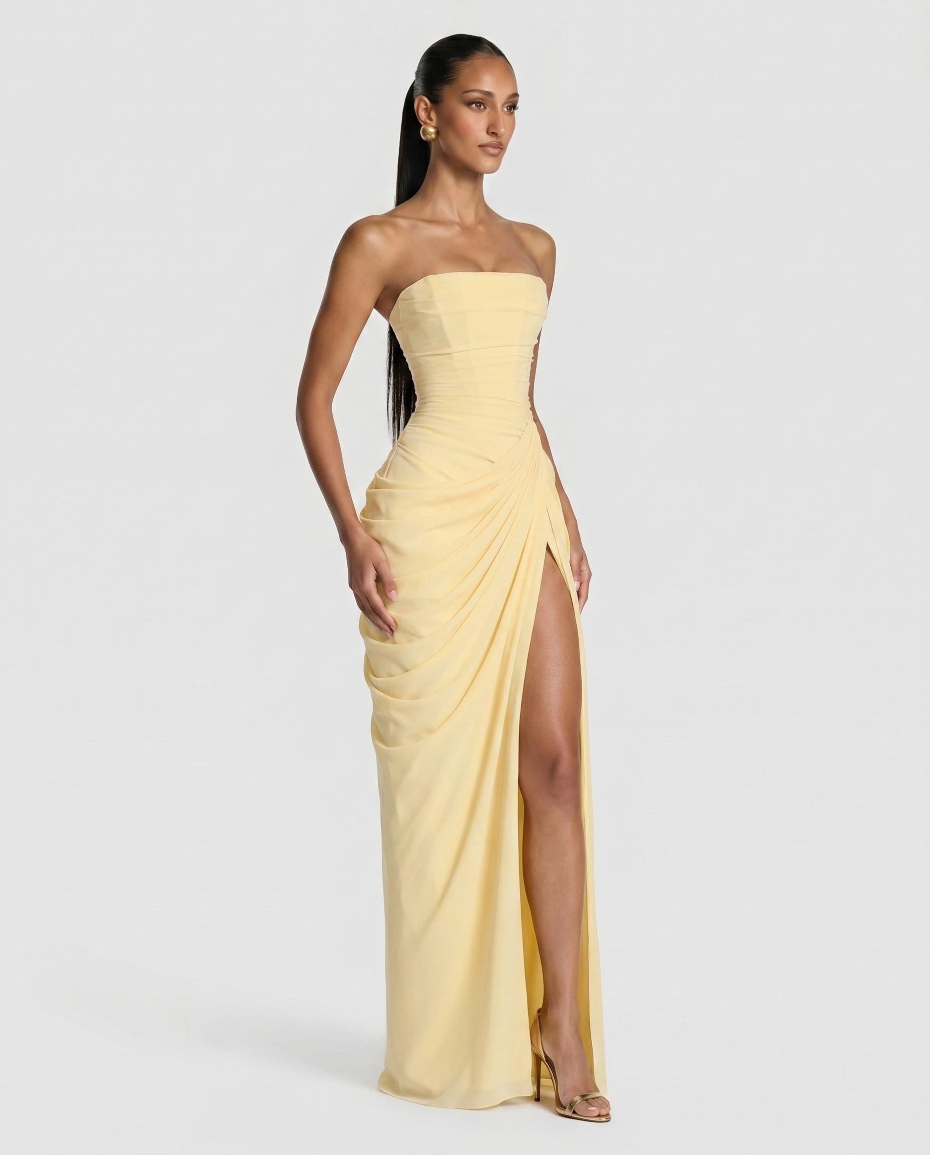 Robe longue bustier jaune beurre, drape asymetrique trois-quart