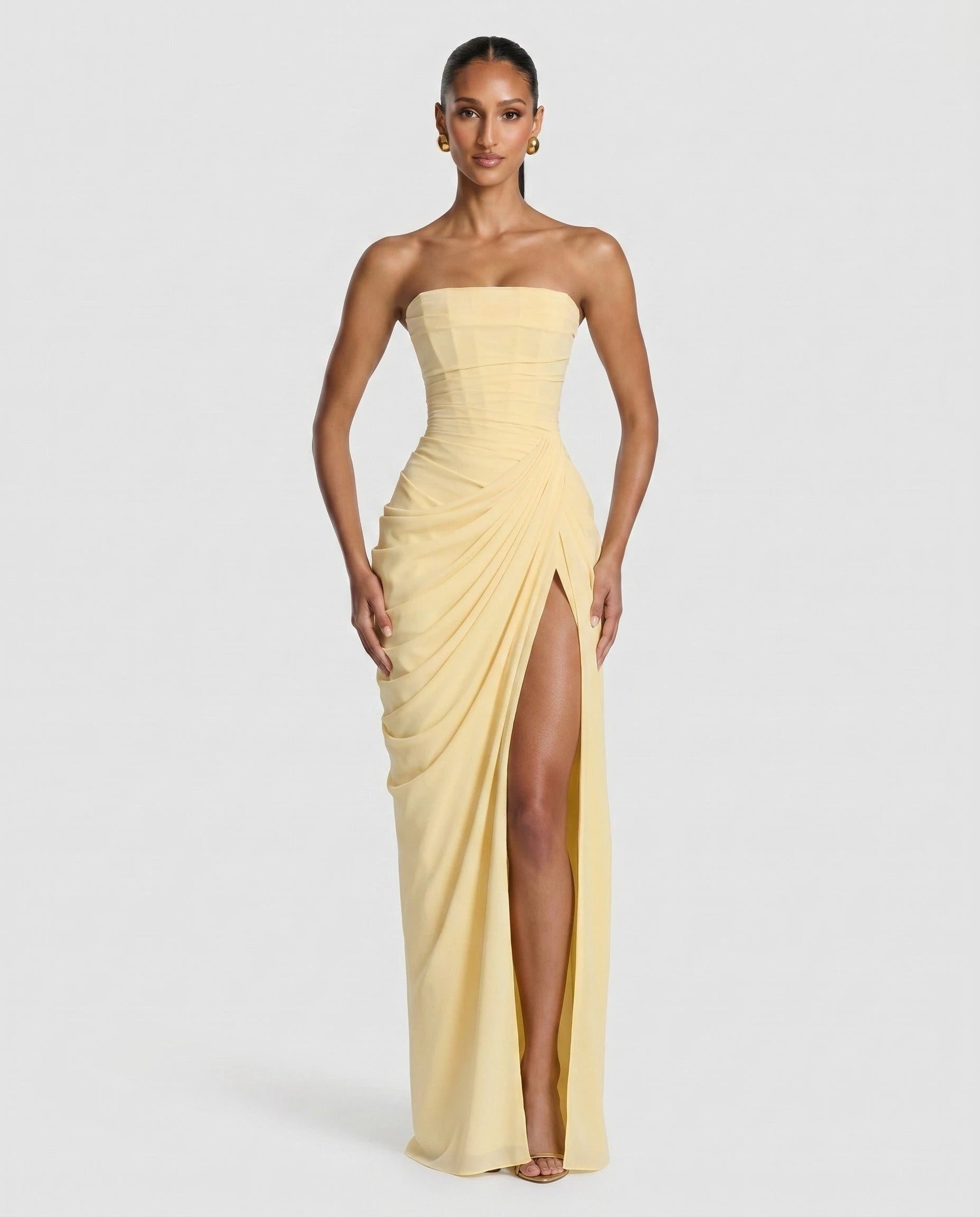 Robe longue bustier jaune beurre, face plein pied fente