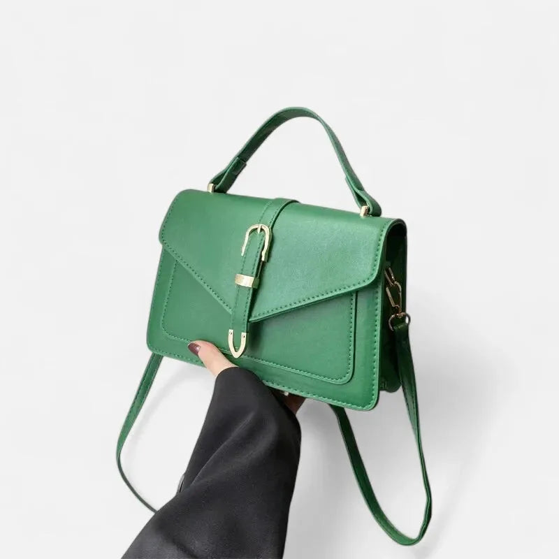Petit sac à main bandoulière à rabat aux finitions doré Isaline