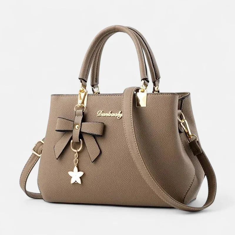 Petit sac à main bandoulière avec son charms noeud et fleur Léana