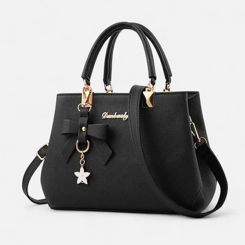 Petit sac à main bandoulière avec son charms noeud et fleur Léana