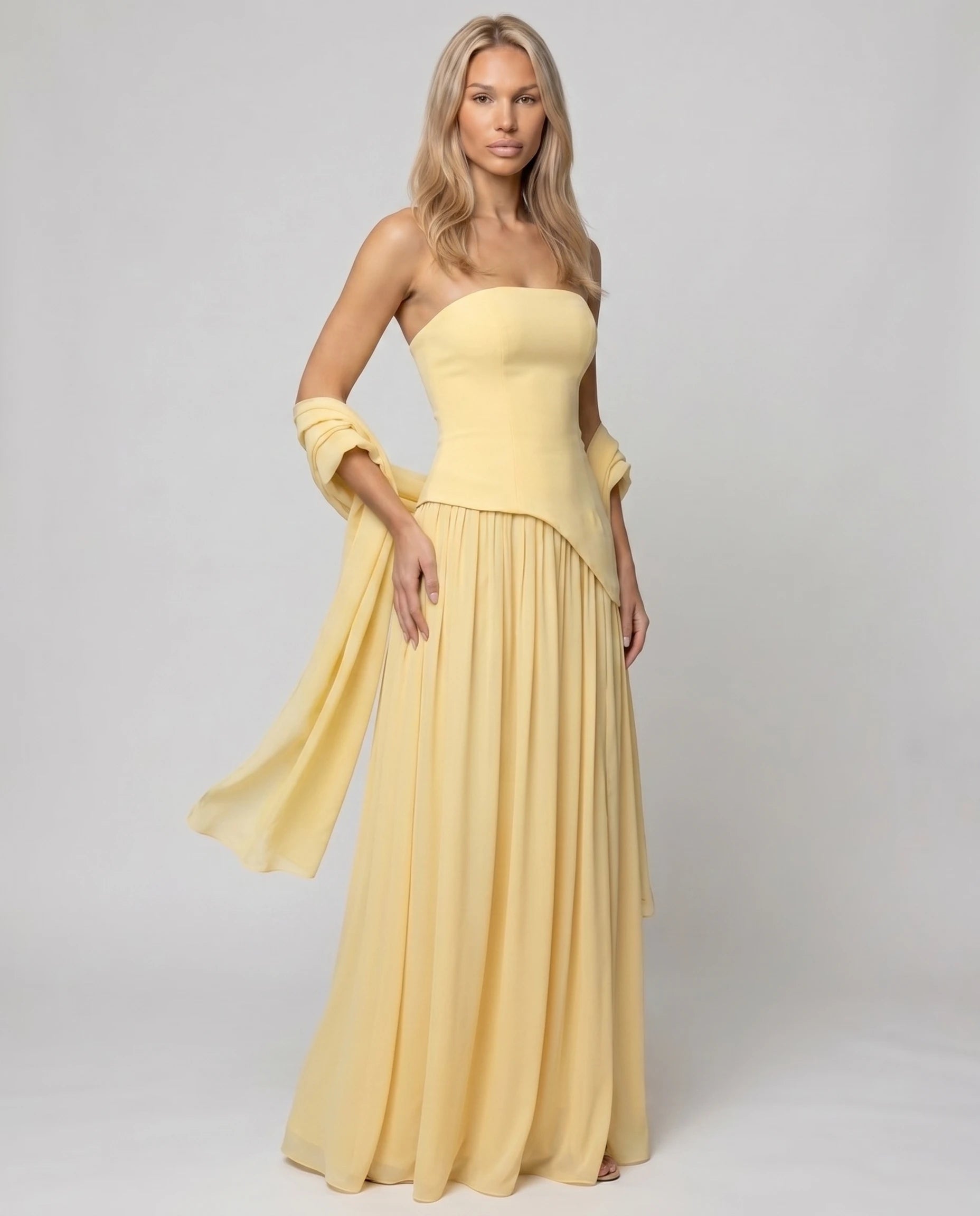 Robe longue bustier asymetrique jaune beurre, jupe chiffon fluide ceremonie (vue trois-quarts plein pied)