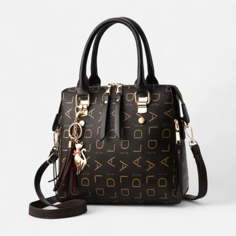 Sac à main bandoulière avec son charms chat doré Émilie