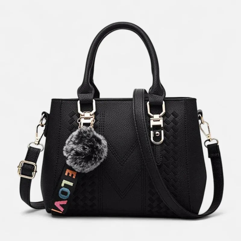 Sac à main bandoulière avec son charms pompon Aurore