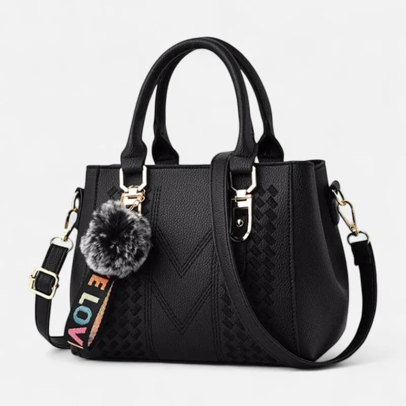 Sac à main bandoulière avec son charms pompon Aurore