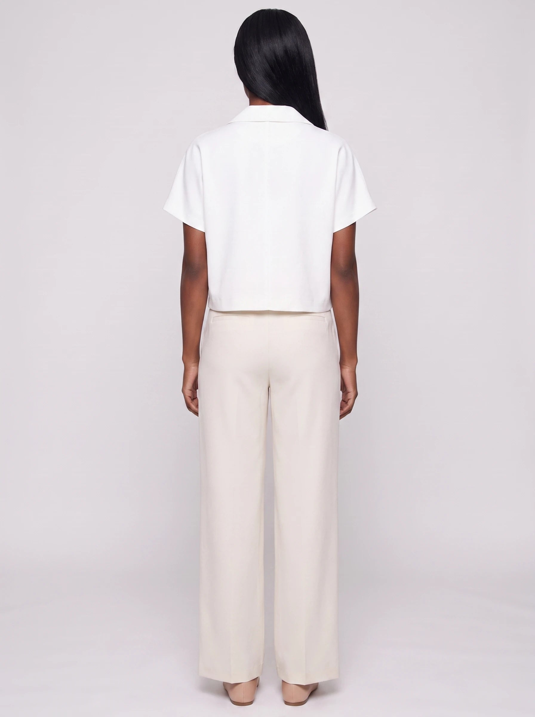 Veste courte zippée à manches courtes blanche Gilberte, vue de dos en studio