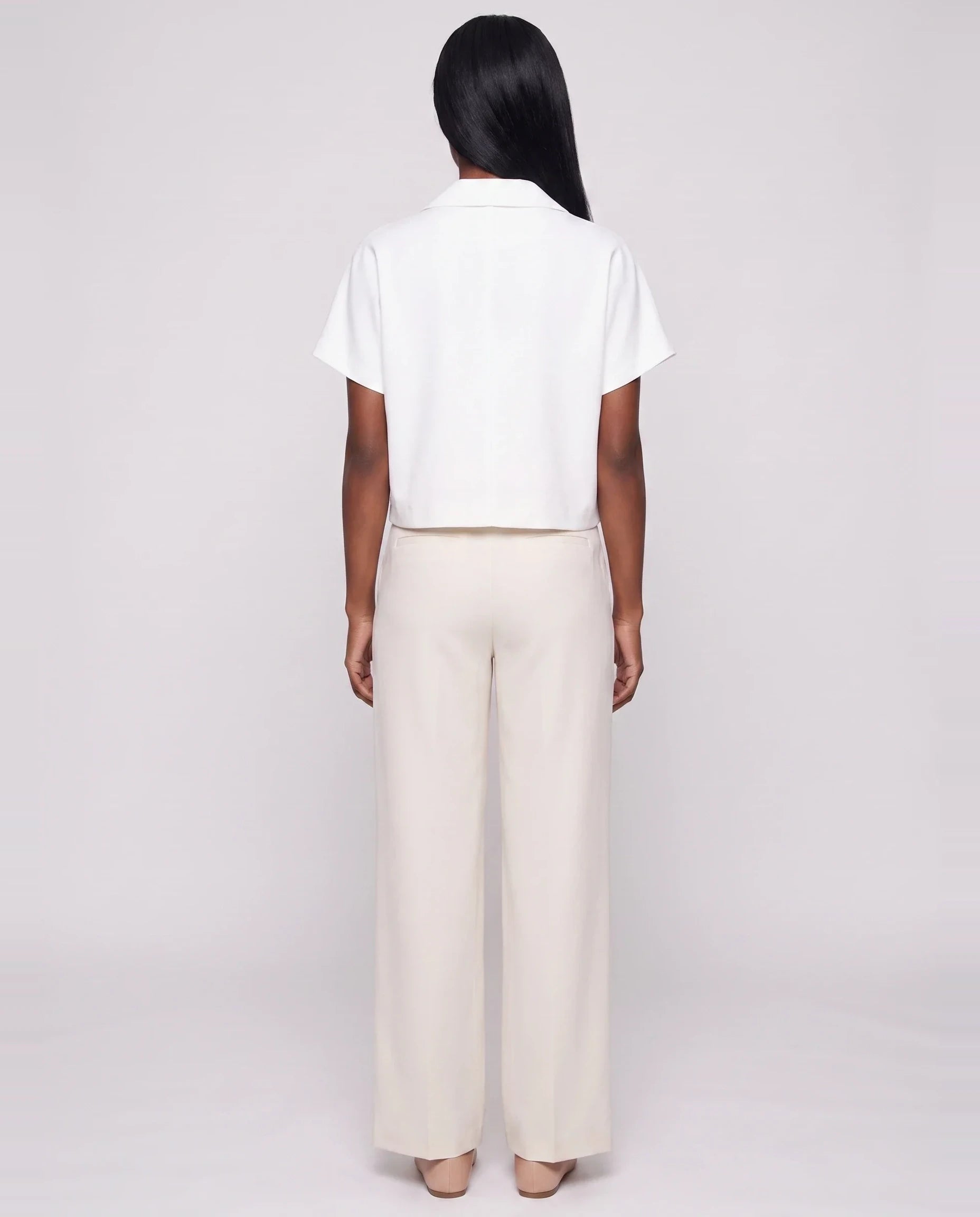 Veste courte zippée à manches courtes blanche Gilberte, vue de dos en studio